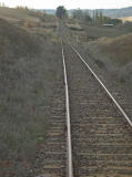Another small buckle on the line is easily seen as Chakola station rapidly approaches, beyond the next cutting.