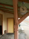 Platform and shelter at Crookwell railway station. The clock works, and keeps good time. In the background the line heads towards the buffer stop.
