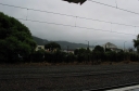 A gray day in Lower Hutt. In the background is Wainui Hill Road snaking towards Wainuiomata.
