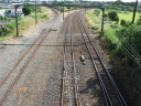 An overhead view of the railway junction. Here the overhead power lines show where the points off the main line originally were. The branch line was formerly electrified at least as far as the railway workshop.