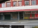 A longer shot showing the old Ceroc venue entrance, its neighbours, and the Vivian Street roadway.