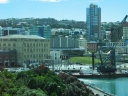 Looking out from Te Papa, further south. The Majestic Centre appears on the right hand side. To the left of it, the circular building is the Michael Fowler Centre. To the left again is the old Odlin building. Above it near the hilltop are some of the buildings of Victoria University.