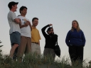 Haydn, Mauricio (Jann behind him), Iain, Shami, and Denise enjoy the moment from on top of a sand dune.