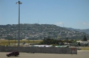 Looking across the runway at Wellington Airport towards Mount Victoria. The houses are part of the suburb of Hataitai.