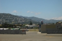A view from the international departure lounge at Wellington Airport. Looking slightly further north than the last shot, the hills in the distance are part of the suburb of Khandallah.