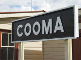'Cooma' station board at the northern end of the platform, facing west.
