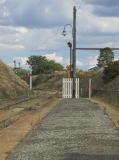 A look along the southern end of Cooma platform back to the cutting and signals.