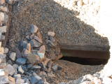 A view of a decking hole on Guises Creek bridge.