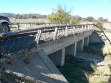 The western wall of the concrete bridge at the southern end of Williamsdale yard, looking down the line.