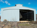 The carriage shed at Michelago. One of the doors has been blown in by the wind.