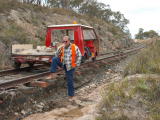 Rainer shows the difference between the rail height and the present height of the adjacent rocky surface.