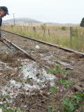 Hail and debris across the railway track around 344.3km.