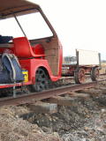 Trackman and trolley sitting on exposed sleepers near 343.3km.