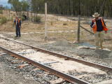 A new layer of topsoil has been washed onto recently reballasted railway track at Tuggeranong Siding.