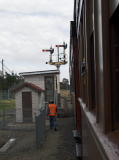 The train approaches the signals at Queanbeyan station.