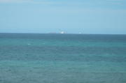 What's visible of the Rena from Papmoa Beach, before it broke apart.