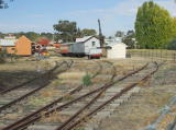 The entrance to the Yass railway yard from the track along Dutton street. The siding on the right would appear to have continued on to what is now park land.