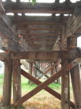 The underside of the southern end of the Yass river railway bridge. Some track can be seen at the top.